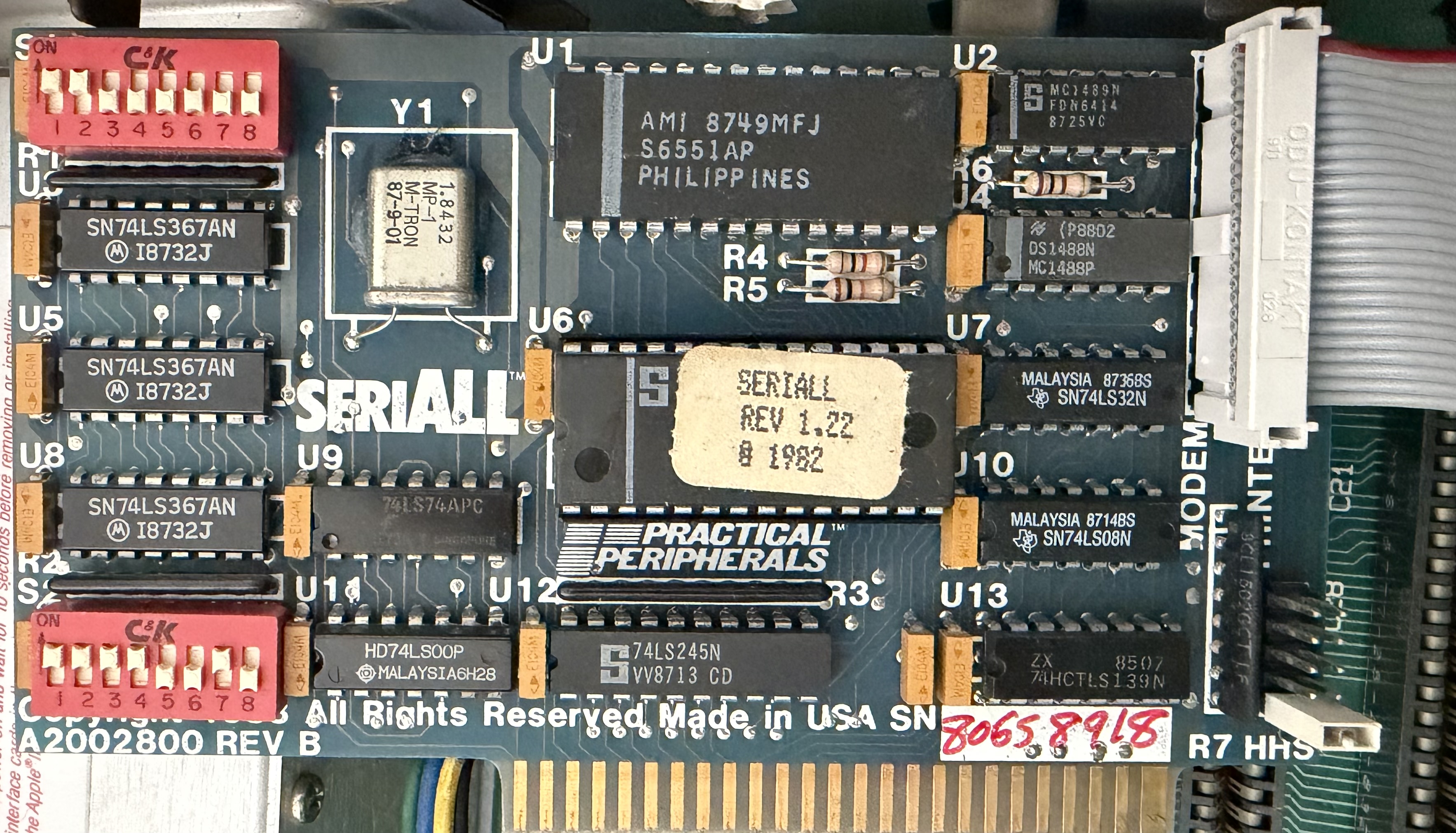 Practical Peripherals seriALL card showing DIP switch configuration
